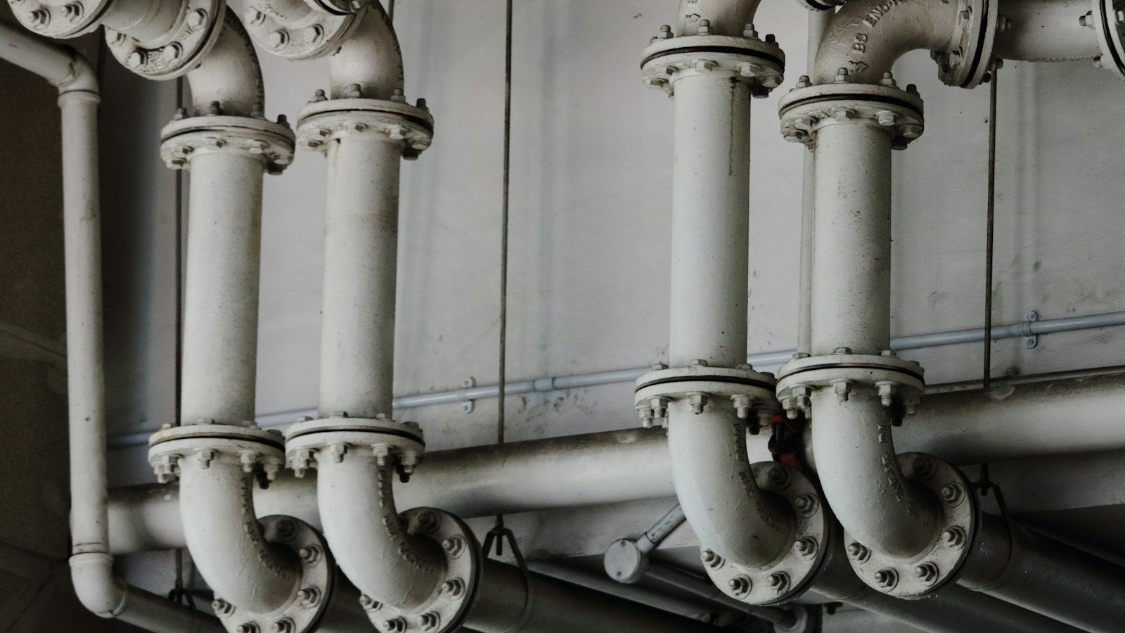 Dense industrial piping with flanges and valves